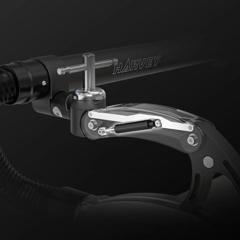 Close-up of a bow with 'Harvey' branding on a black background