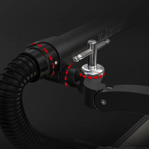 Close-up of a black hose with a silver valve on a dark background, featuring the brand 'Harvey'.